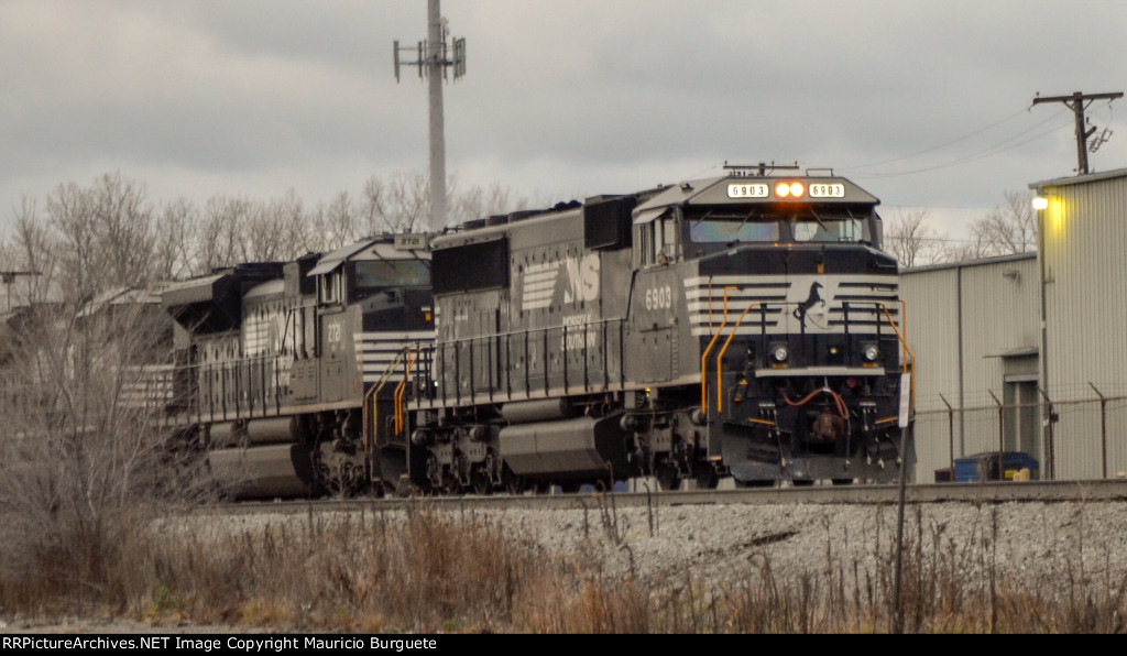 NS SD60E Locomotive leading a train